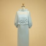 Two-piece set with a satin dress and an organza blous