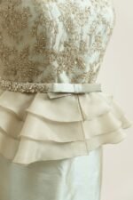 Dress made of soft silk taffeta with French lace